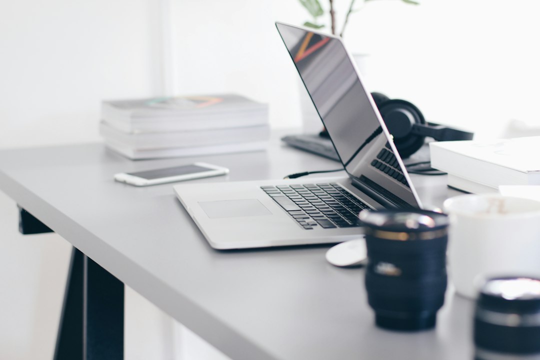 Clean laptop setup with sleek web application